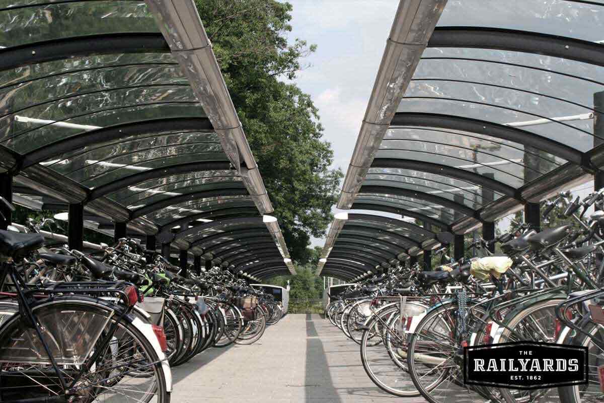 Image of bikes parked along a rack. Discover 5 lessons from the world's most sustainable cities.