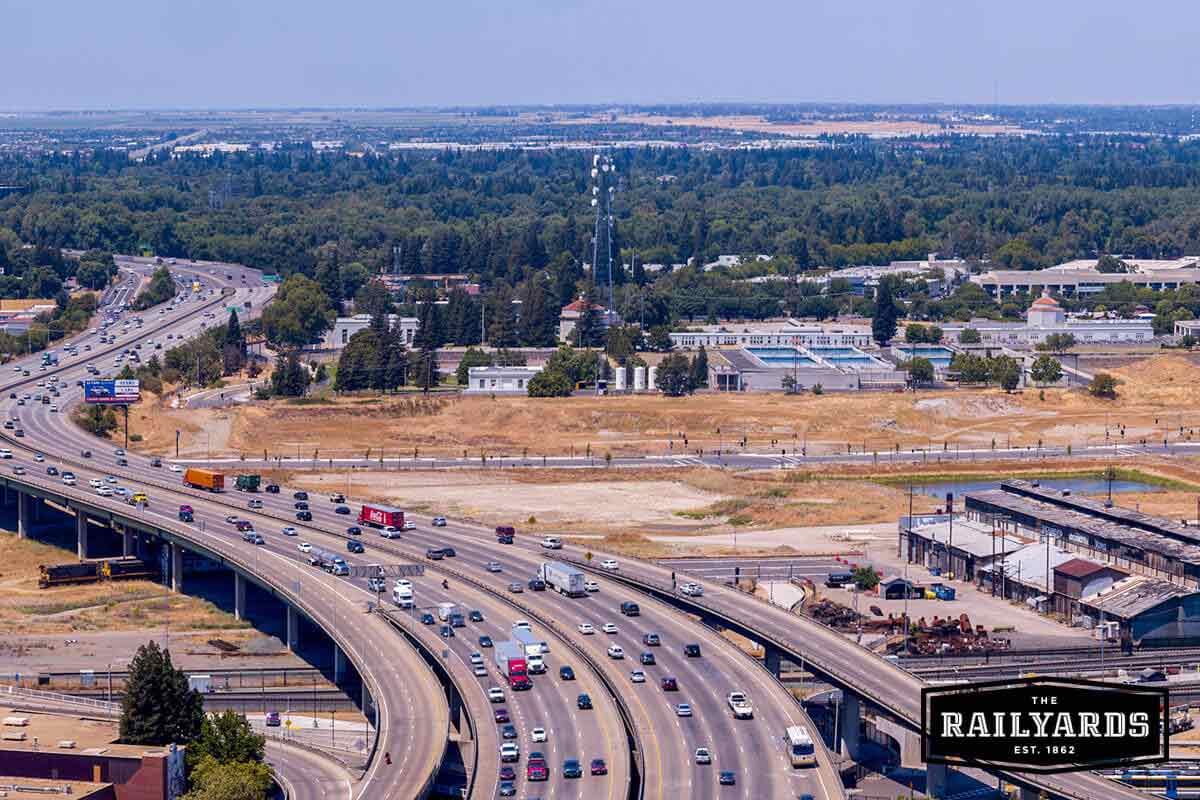 Overhead view of a freeway interchange. Learn more about the future of transportation in Sac.